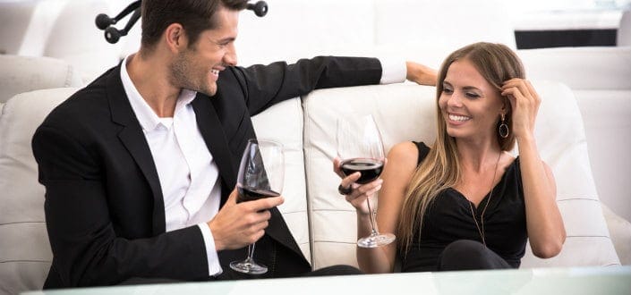 Couple drinking red wine in the restaurant