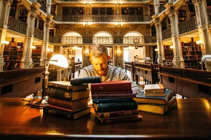 person studying at the library