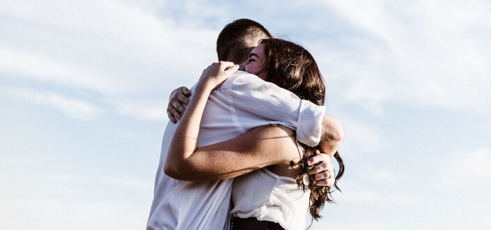 couple hugging each other tightly