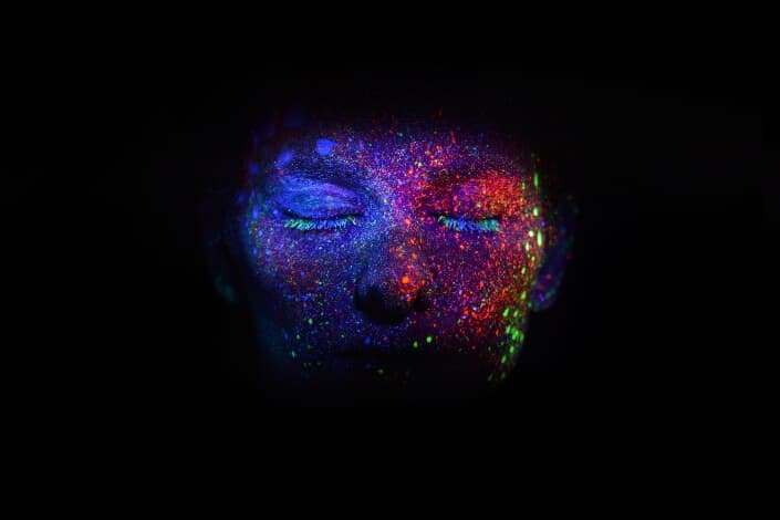 woman's face with glitters 