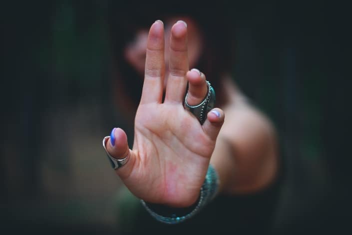 palm of hand with rings and bracelets