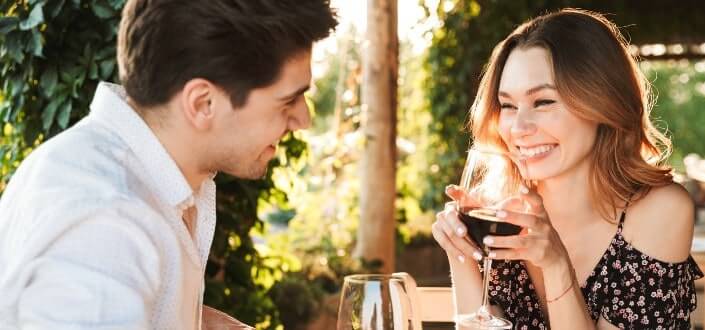 young loving couple sitting in restaurant 