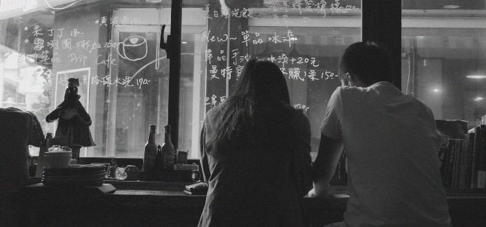 couple on a date inside cafe