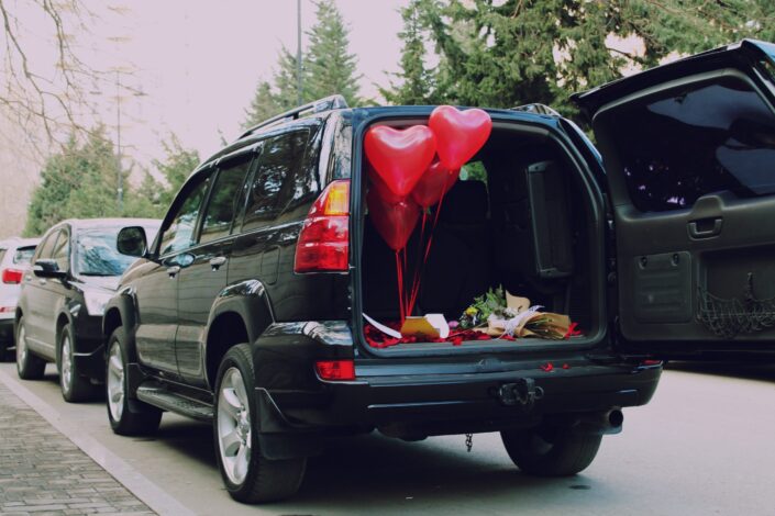 Open car trunk with a romantic surprise