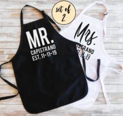 pair of black and white Personalized Mr and Mrs Apron