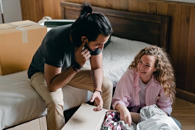 Man surprising his woman with gifts - birthday gifts for husband