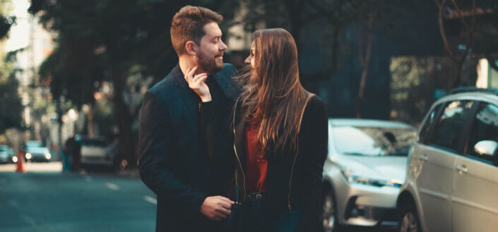 couple flirting in the road