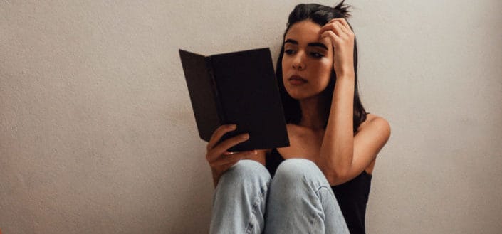 what to do after a breakup - Pick Up a Good Book to Read