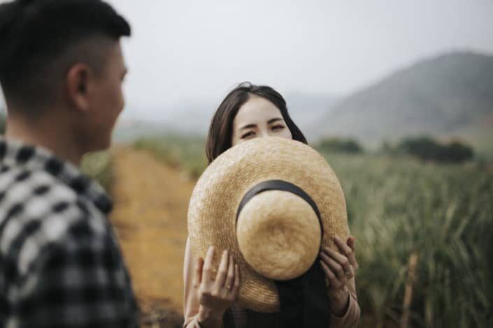 man and woman flirting in a farm