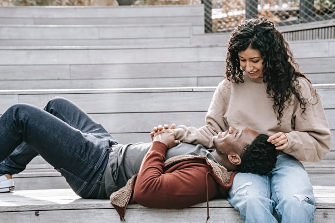 couple flirting at the stairs - flirty questions