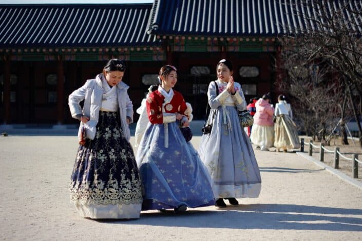 three korean women wearing hanbok