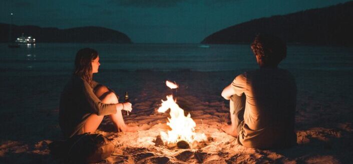 Couple camping on the beach.