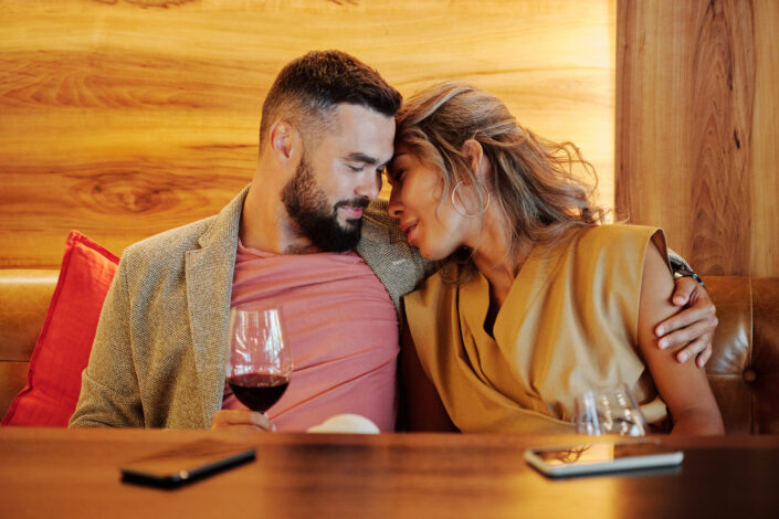 Loving Couple Drinking Wine in a Restaurant