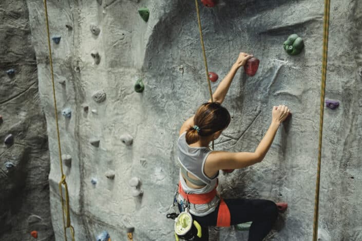 Woman wall-climbing