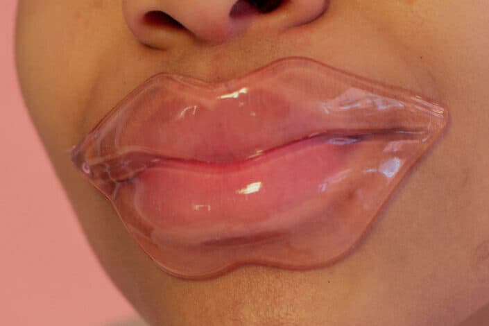 Lip being pampered with a lip mask