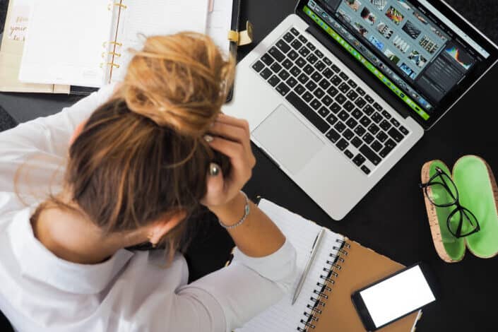 woman being stressed in her work