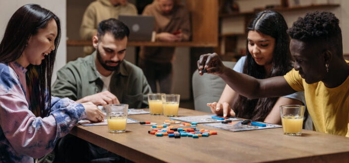 Group of People Playing A Board Game