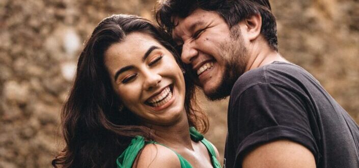 Sweet couple laughing together.