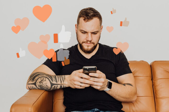 Man Using Phone surrounded with likes and hearts
