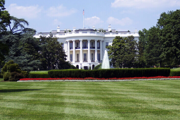 White House with wide grass field