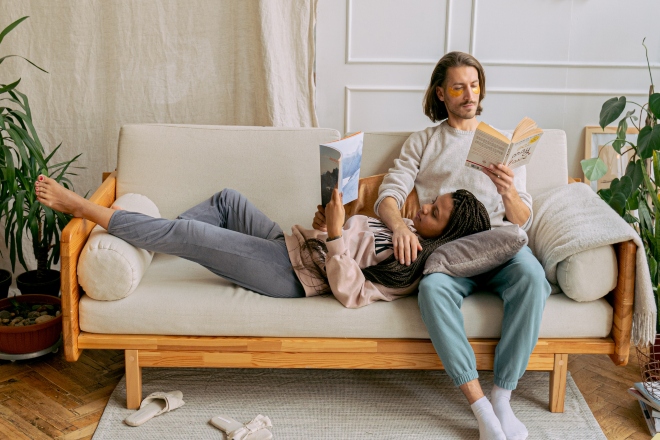 Do Open Relationships Work - Couple reading books together while on couch