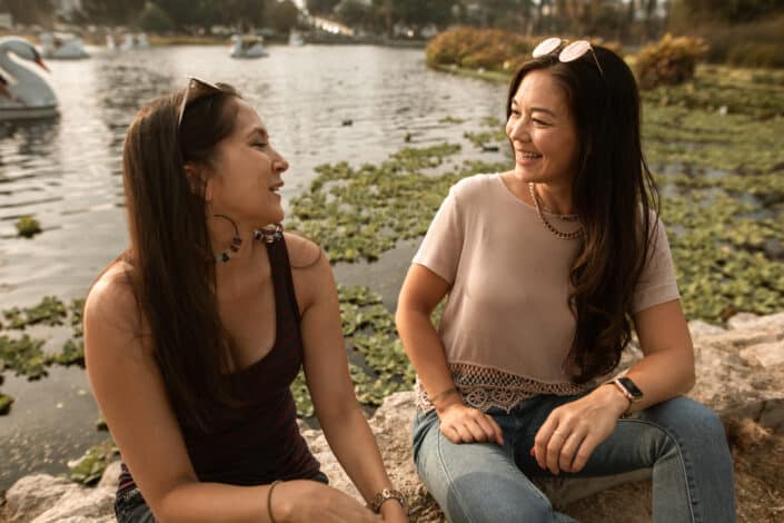 two-women-talking-and-smiling-stockpack-pexels