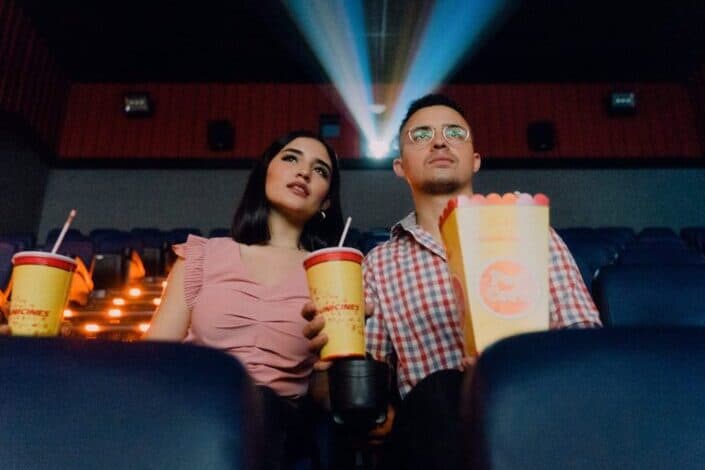 Couple Watching a Movie Seriously 