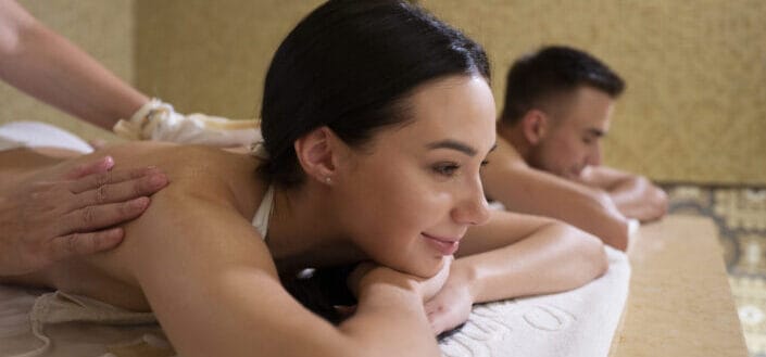 Man and woman having a spa massage