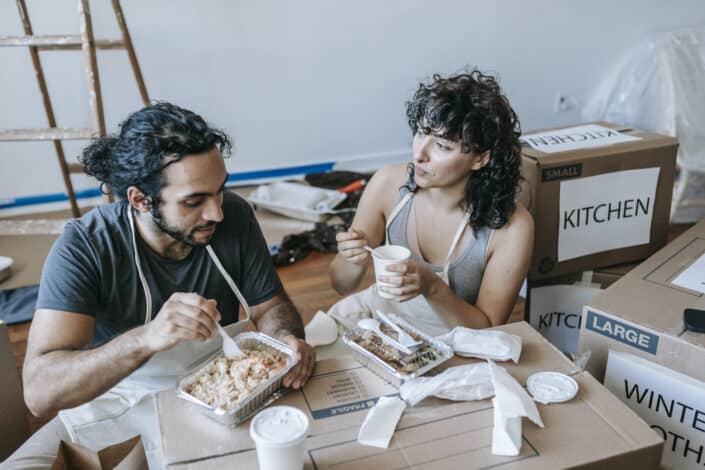 couple eating together in their apartment