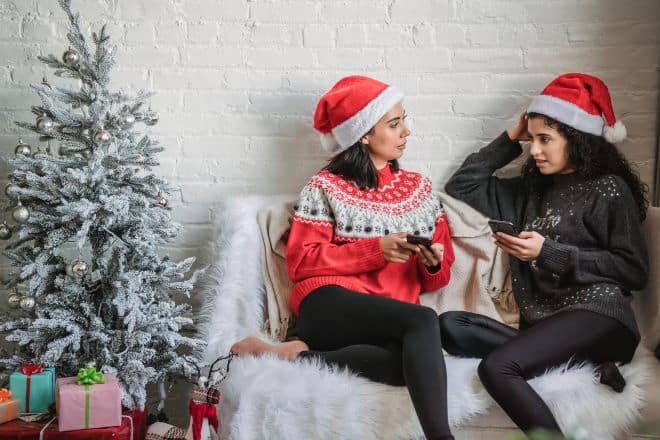 Best Friends Hanging Out Near a Christmas Tree - Secret Santa Questions