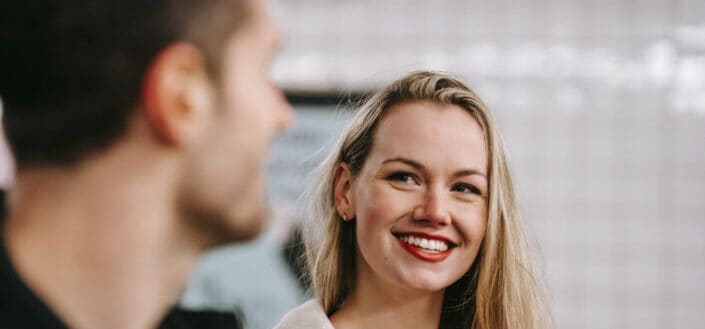 woman smiling at her boyfriend