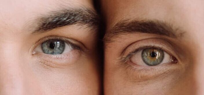 Eyes of Two People Leaning Close to Each Other