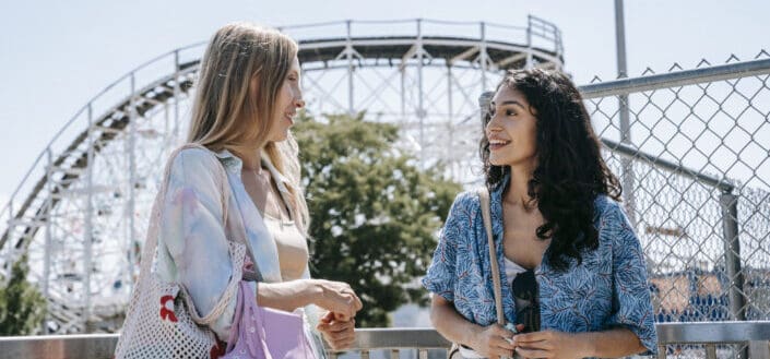 ladies chatting in amusement park