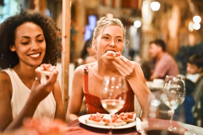 Woman Eating Bruschetta