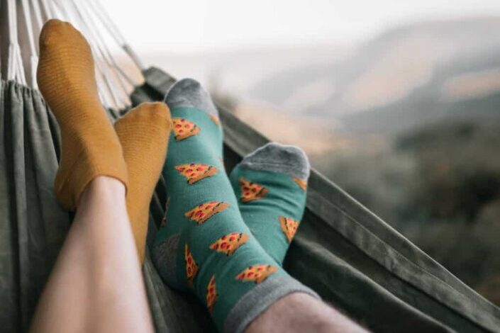 Two People Wearing Colorful Socks