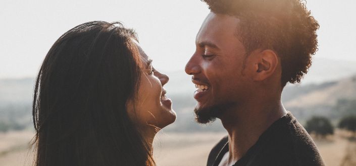 Man and Woman Laughing Together