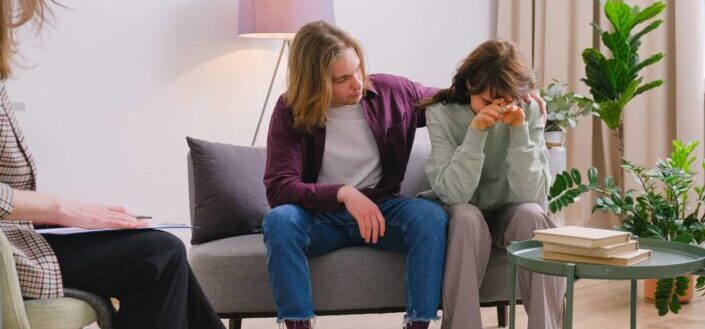Couple discussing problems with psychologist
