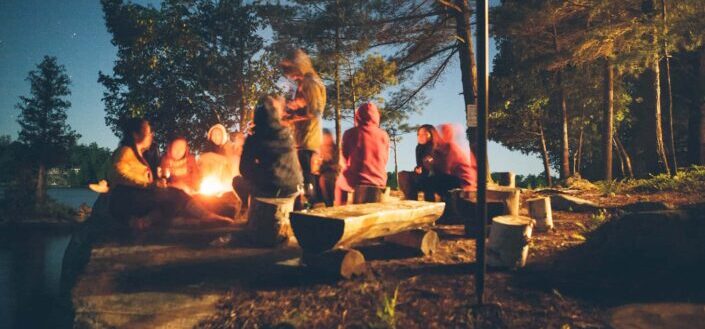 Group of people near bonfire