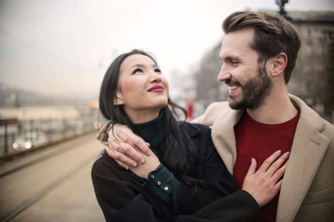 Couple clinging to one another while walking - How To Not Be Clingy