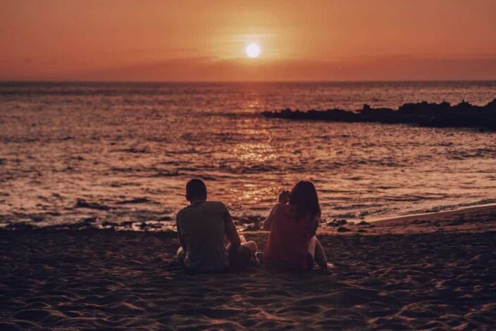 couple enjoying the sunset view