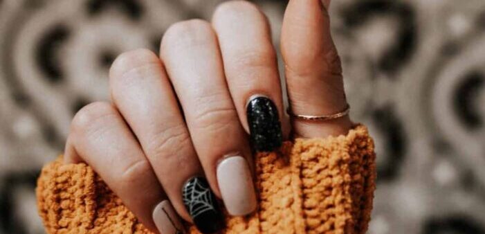 Hands of a person with nail art